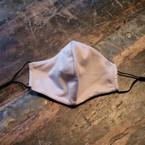 Athleta Lilac face mask with black ear loops